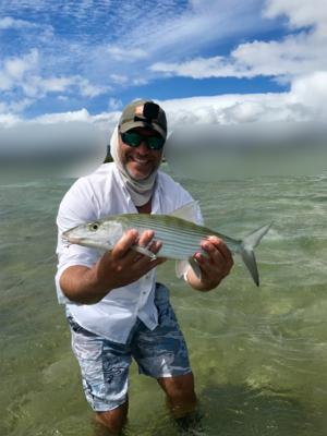 <p>John with his first Bonefish on fly in Hawaii</p>